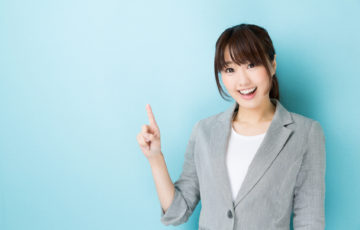portrait of asian businesswoman on blue background
