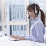 Young woman wearing a headset